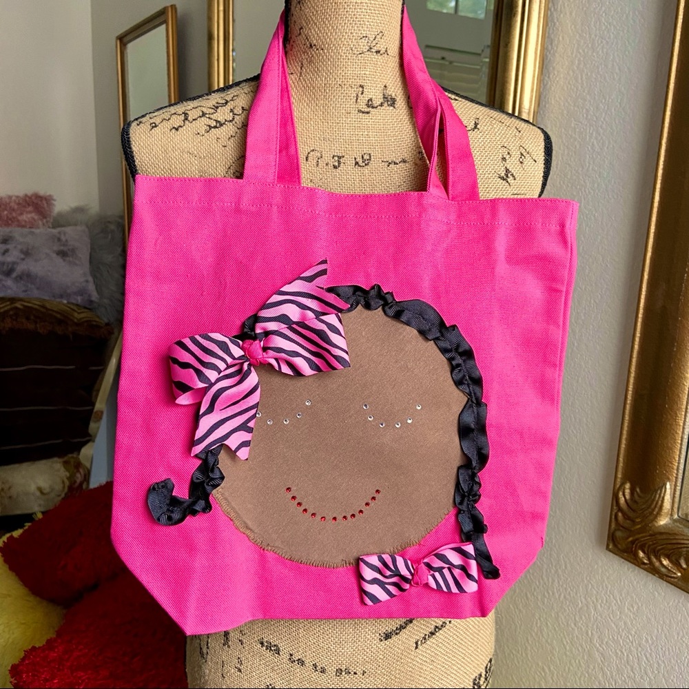 New Brown face girl tote bag in hot pink.